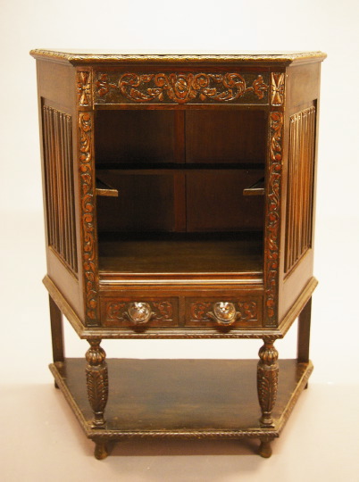 Appraisal: Jacobean-Style Carved and Stained Walnut Open Cabinet early th century