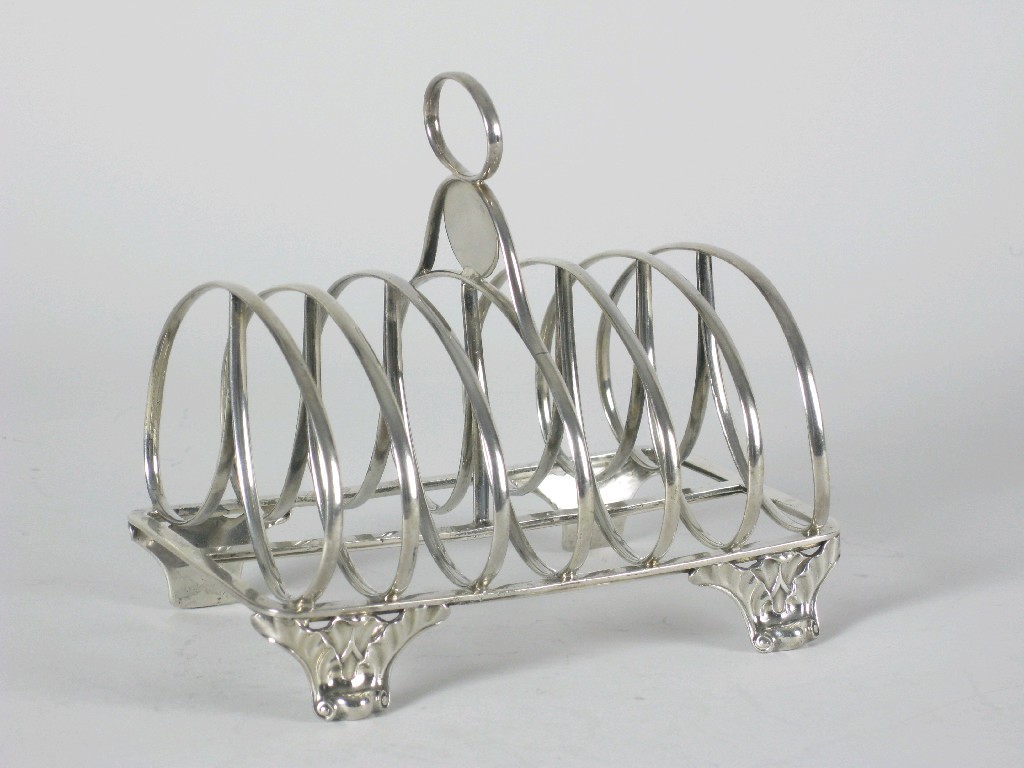 Appraisal: A William IV large seven bar Toast Rack on leafage