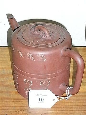 Appraisal: A RED WARE TEAPOT and cover with Chinese script to