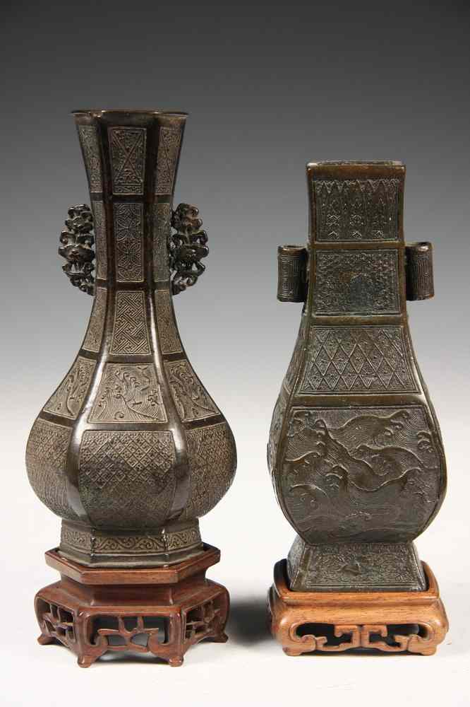 Appraisal: CHINESE MINIATURE BRONZE VASES ON STANDS - Including Square Baluster