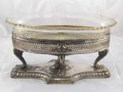 Appraisal: An antique silver plated serving dish with glass liner chipped