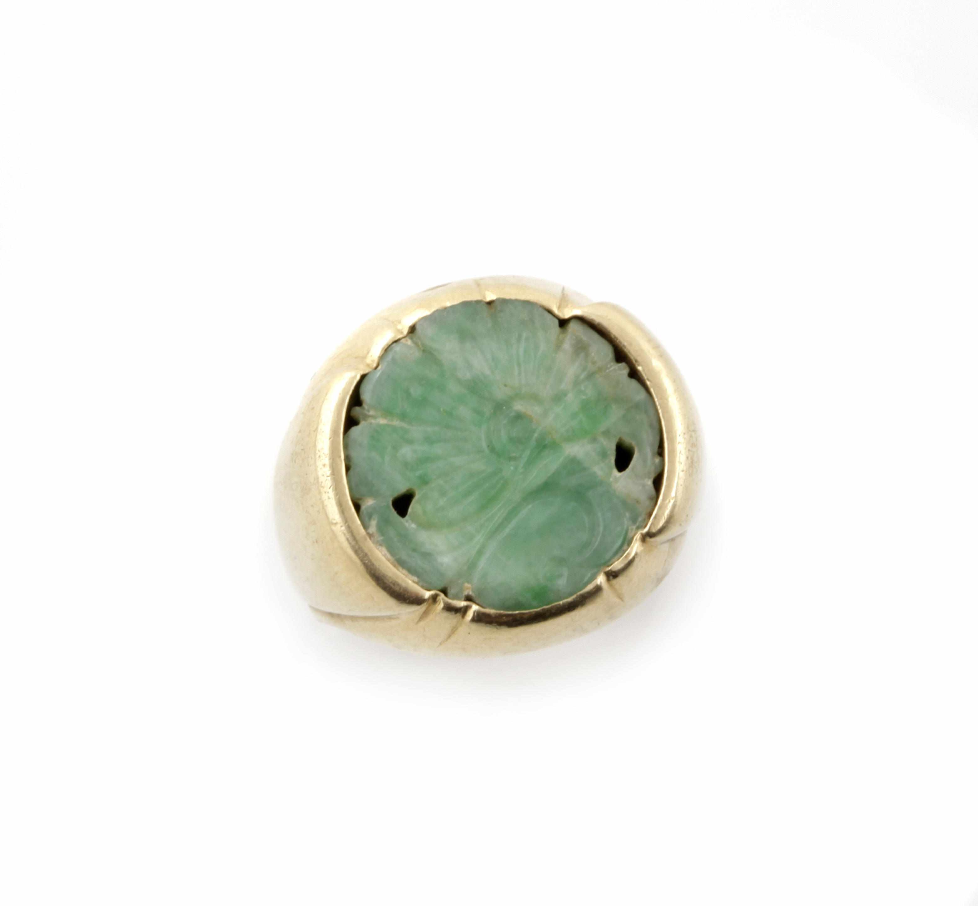 Appraisal: A jade and k gold gent's ring size