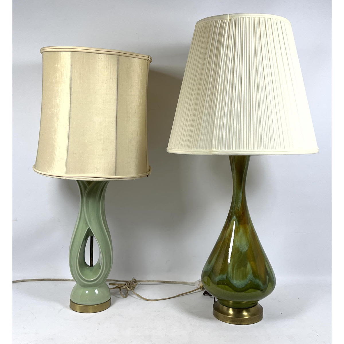 Appraisal: Two Green Glazed Pottery Mid Century Modern Table Lamps Dimensions