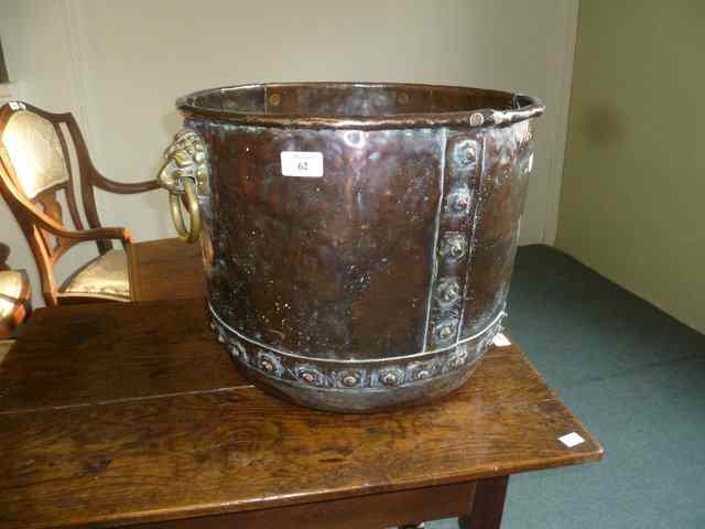 Appraisal: A TH CENTURY COPPER LOG BIN with studded decoration and