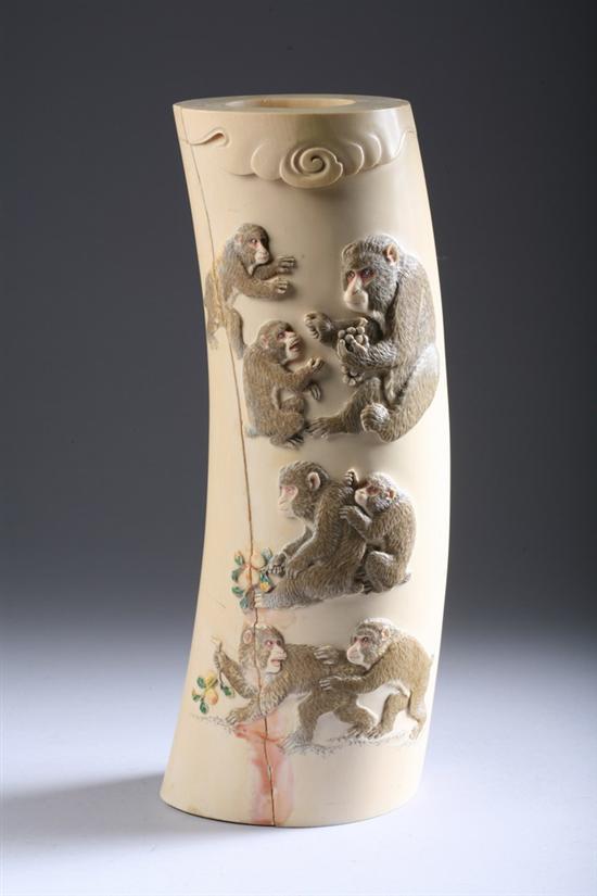 Appraisal: JAPANESE IVORY CARVED TUSK Carved to depict monkeys signed -