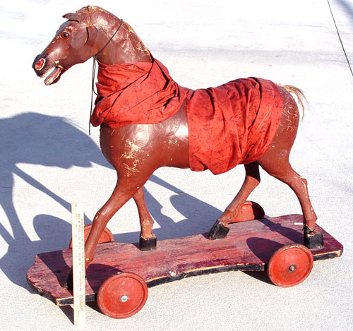 Appraisal: CHILD LEATHER RIDE ON PULL HORSE On board with wheels