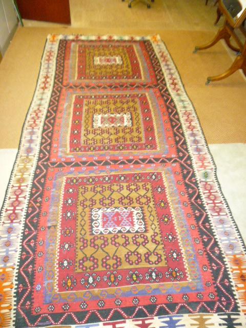 Appraisal: AN EASTERN TURKISH FLAT WOVEN KILIM made in two halves