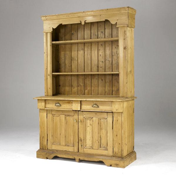 Appraisal: IRISH CUPBOARD Paneled and stepback in pine ca - x