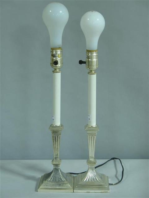 Appraisal: PAIR OF SILVERED COLUMNAR LAMPS Of tapering square reeded form