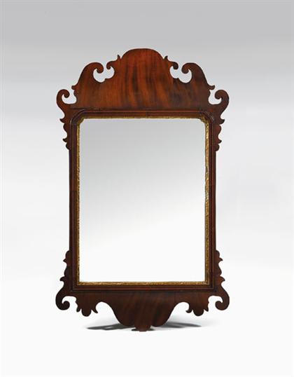 Appraisal: Chippendale mahogany looking glass Scrolled cresting above shaped and molded