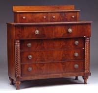 Appraisal: MAHOGANY CARVED COLUMN CHEST Circa Two drawer deck top chest