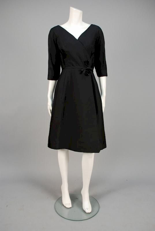 Appraisal: BRANELL FAUX WRAP COCKTAIL DRESS s Black wool silk blend