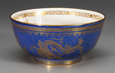 Appraisal: Wedgwood lustre dragon footed bowl mottled blue exterior gilt decoration