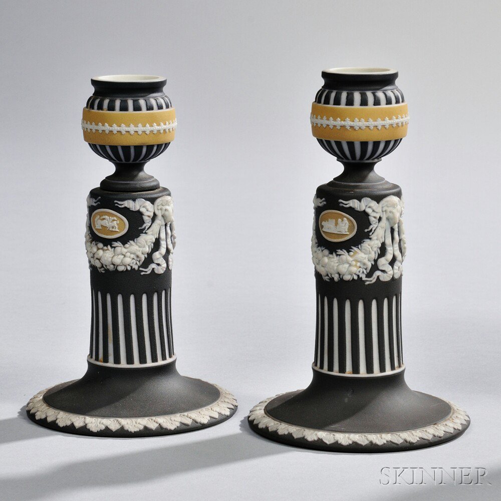 Appraisal: Two Wedgwood Tricolor Jasper Dip Candlesticks England early th century