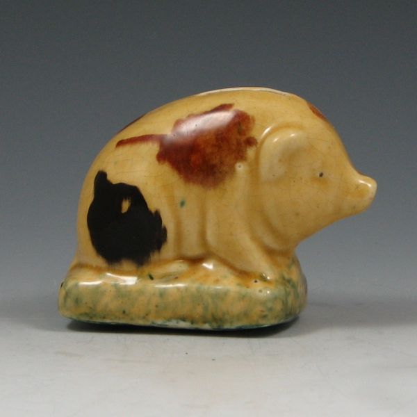 Appraisal: Roseville small sitting pig novelty bank in blended high glaze