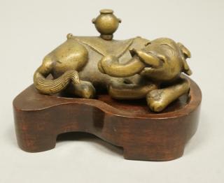 Appraisal: Ming Dynasty Bronze Scroll Weight Elephant form weight with urn