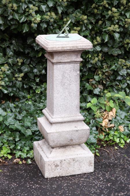 Appraisal: A large granite sundial the brass face with Roman numerals