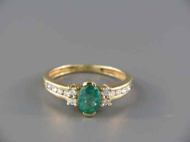 Appraisal: Emerald Diamond Ring carat oval gem with diamonds on each