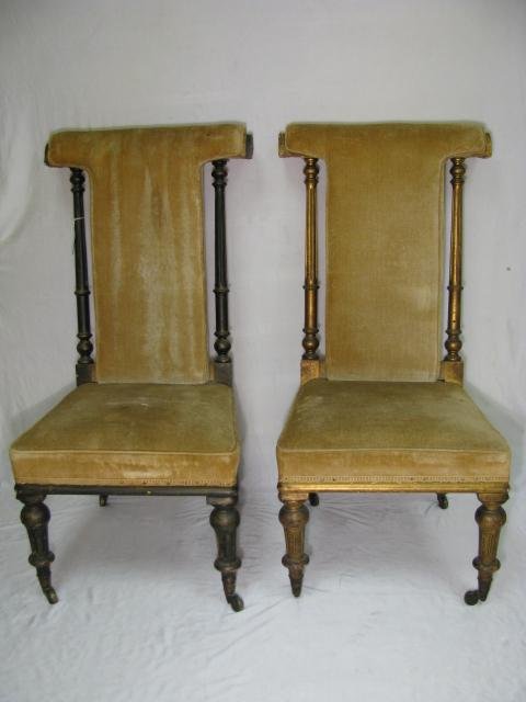 Appraisal: Upholstered gilt painted prayer chairs on castors with rolled edge