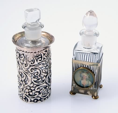 Appraisal: An English plain bottle in ornate silver case together with