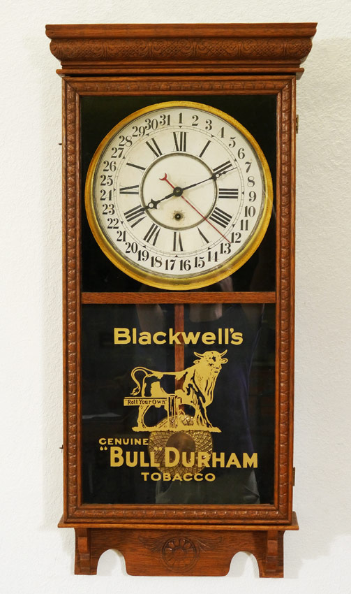 Appraisal: BLACKWELL'S BULL DURHAM OAK ADVERTISING CLOCK Carved oak case regulator