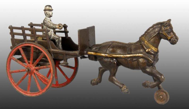 Appraisal: Cast Iron One Horse Road Cart Toy Description Brown painted