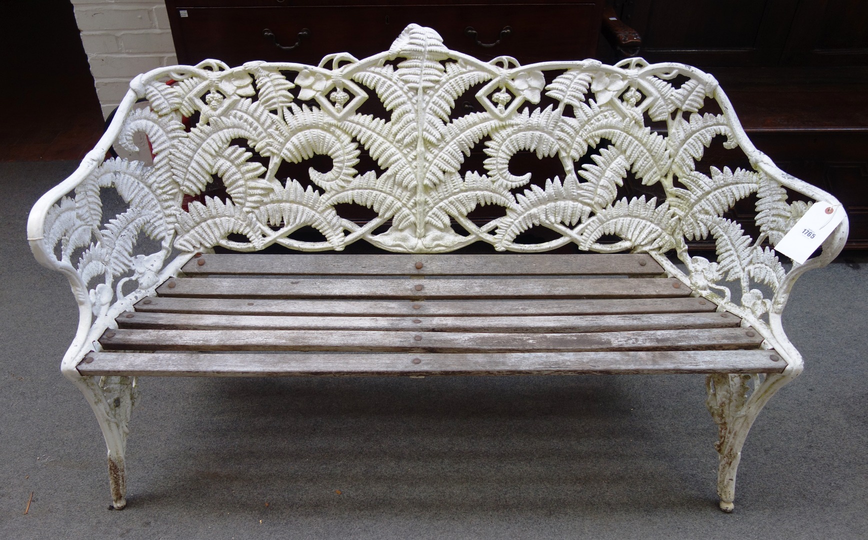 Appraisal: A Coalbrookdale design white painted aluminium garden bench in the