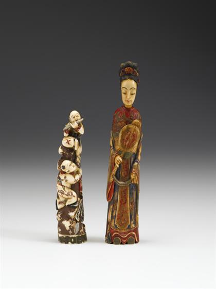 Appraisal: Two Chinese elephant ivory and polychrome figures th century Comprised