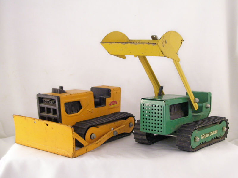 Appraisal: - Tonka Earthmoving Toys Includes Bulldozer in original orange paint