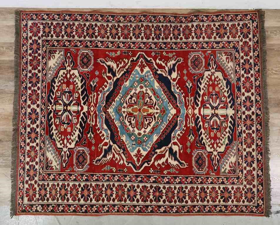 Appraisal: Serapi style rug th century Three red white and blue