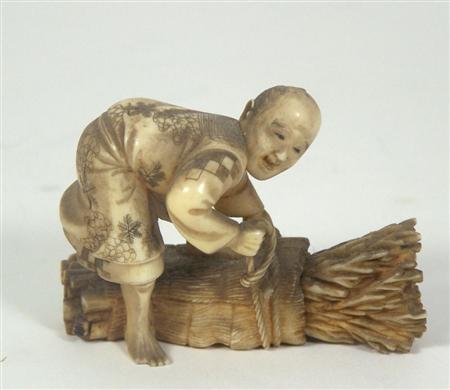 Appraisal: A Japanese ivory okimono of a wood collector Meiji period