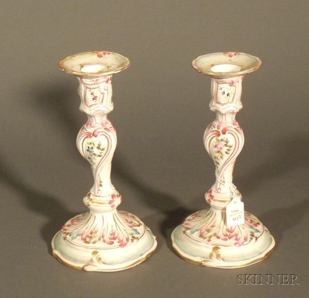 Appraisal: Pair of Enameled Earthenware Candlesticks France th century resembling faience