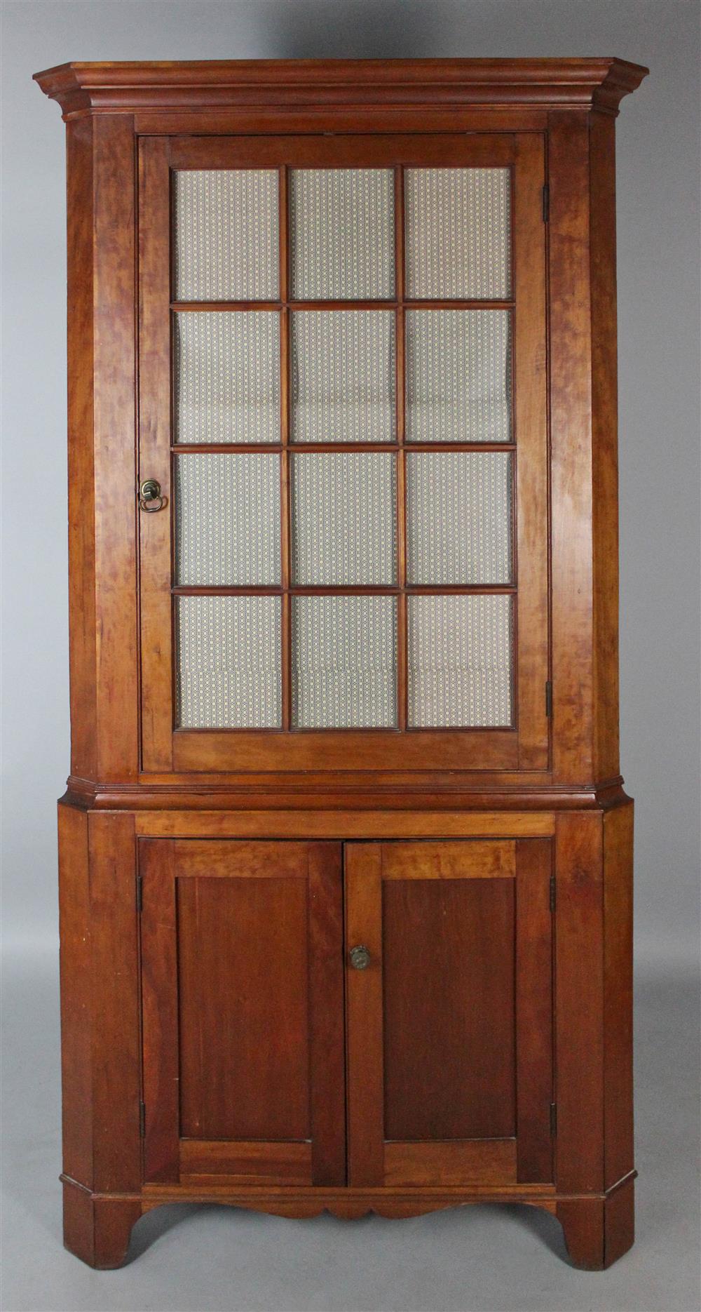 Appraisal: PENNSYLVANIA CHERRYWOOD TWO PART CORNER CUPBOARD EARLY TH CENTURY the