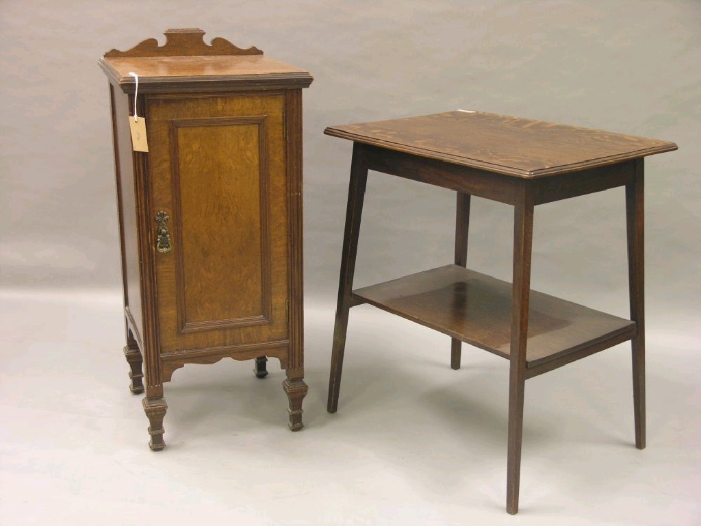 Appraisal: A late Victorian burr oak bedside cupboard enclosed by single