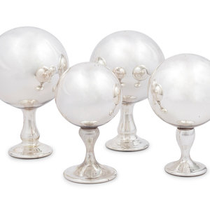 Appraisal: Four Mercury Glass Orbs Height of largest inches