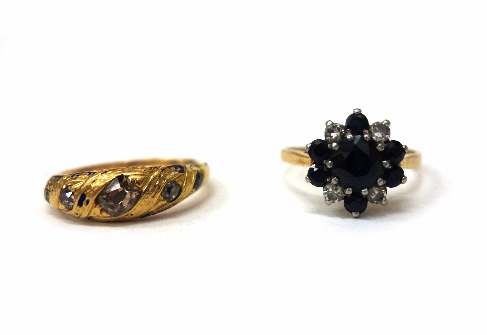 Appraisal: Two gold rings comprising a Victorian gold and diamond five