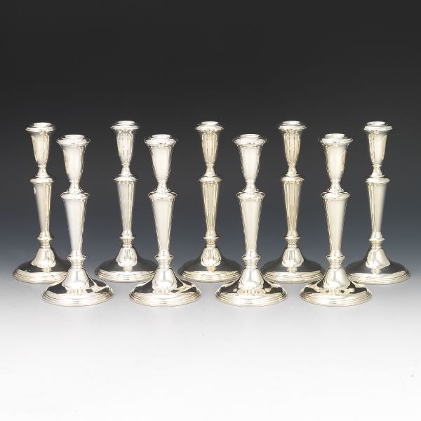 Appraisal: STERLING SILVER CANDLESTICKS BY EMPIRE tall Nine candlesticks Fixed single