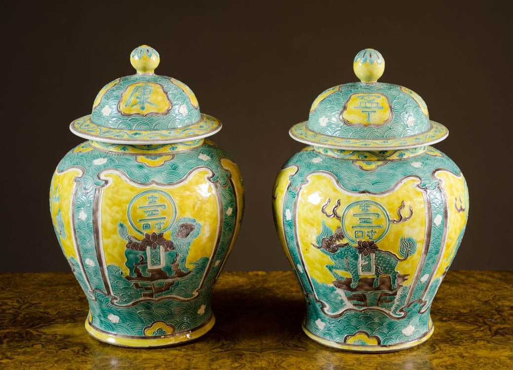 Appraisal: PAIR OF CHINESE QING PORCELAIN LIDDED JARS Kangxi style with