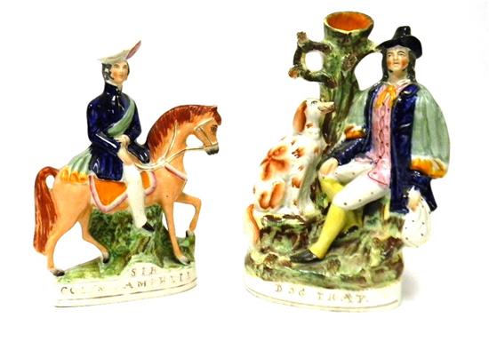 Appraisal: Two Victorian Staffordshire figures Dog Tray multifigural group featuring man