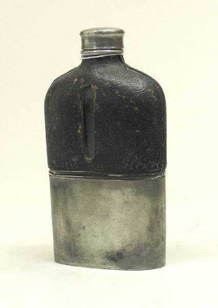 Appraisal: An motorcyclist's pocket spirit flask English circa the half leather