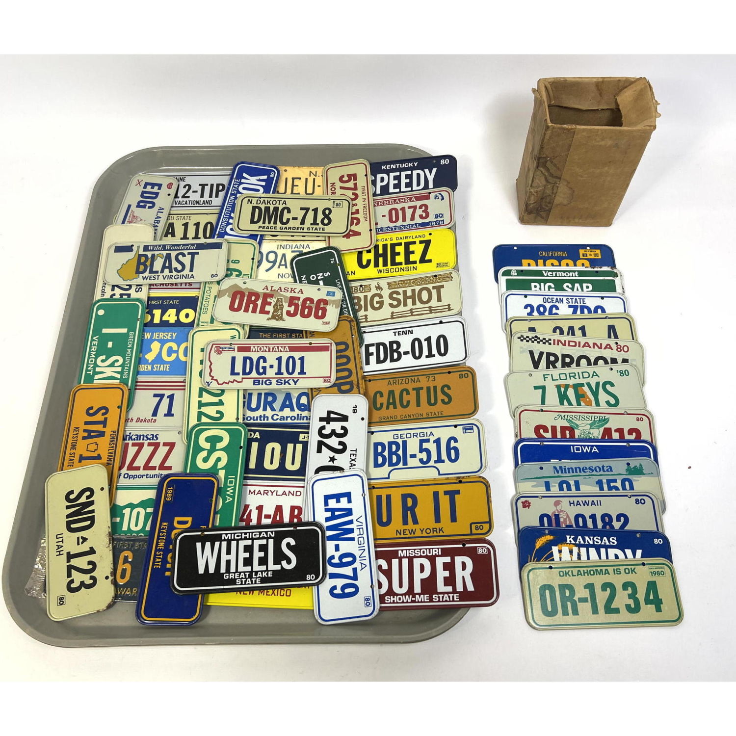 Appraisal: pc Lot Small License Plates Many states Dimensions H inches