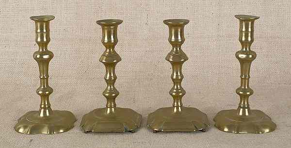 Appraisal: Two pair of English Queen Anne brass candlesticks ca h