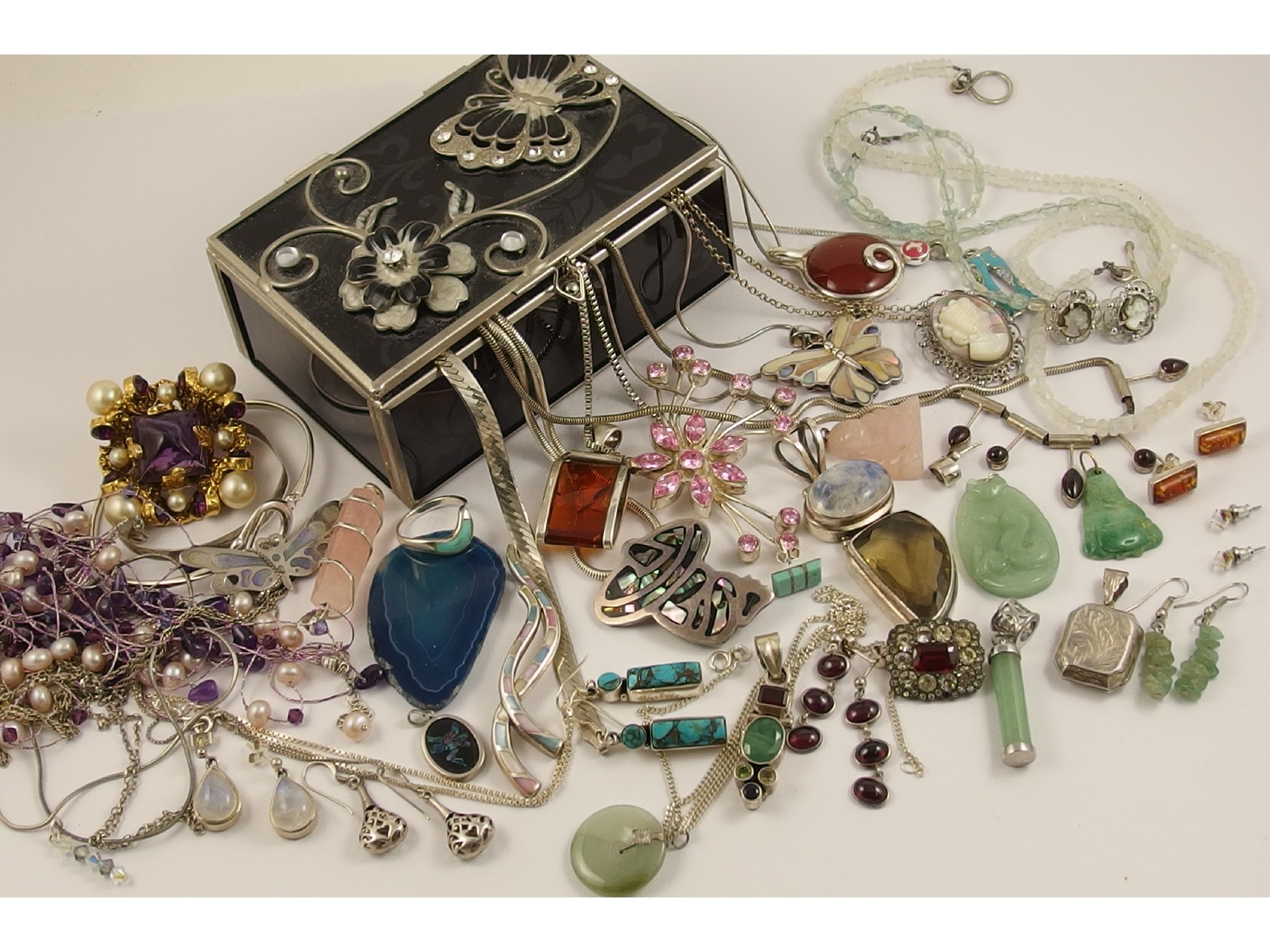 Appraisal: A glass jewellery box filled with silver and costume jewellery