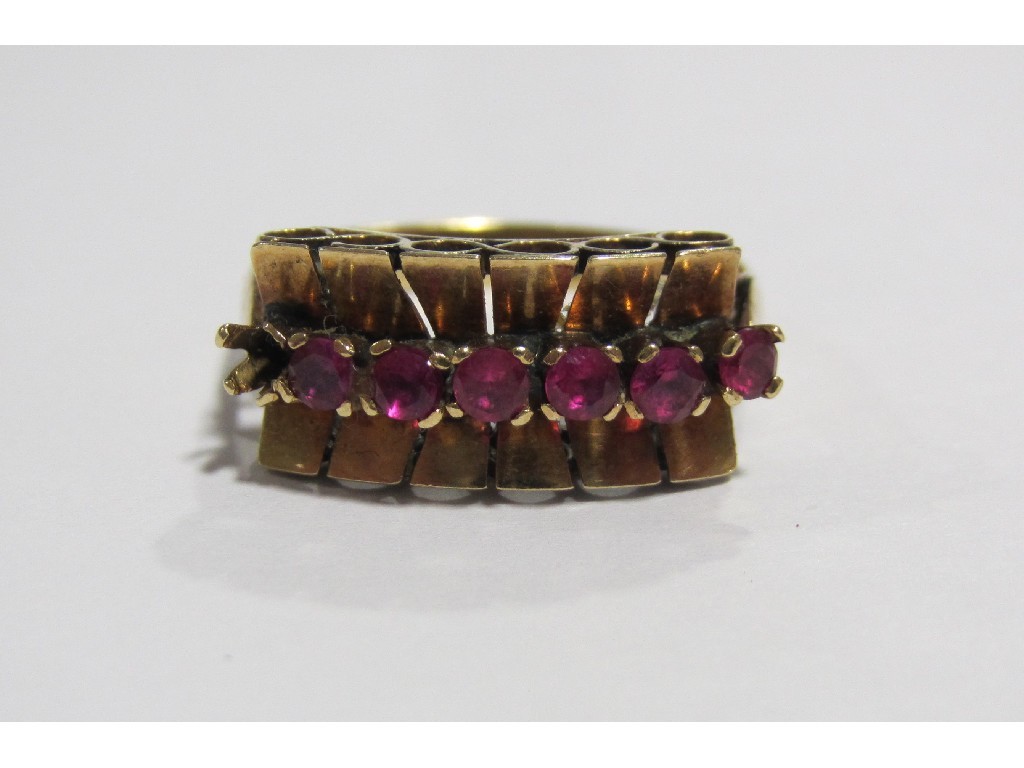 Appraisal: Nineteen forties gold ruby seven stone ring with a straight