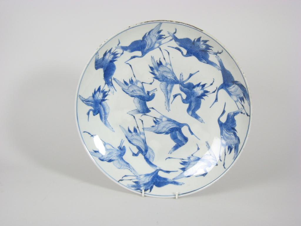 Appraisal: An Oriental blue and white Charger painted storks in flight