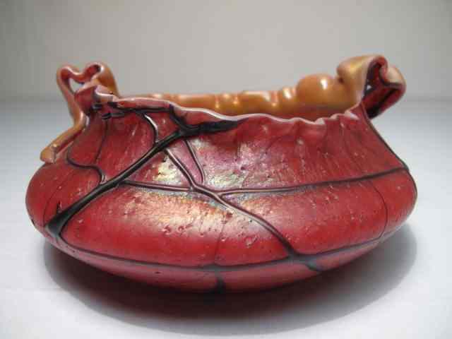 Appraisal: Deep iridescent rose art glass low bowl with all over