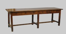 Appraisal: A Large Dark Pine Work Table With Six Drawers A