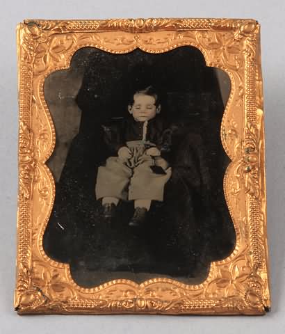 Appraisal: Uncased quarter plate tintype showing full length post-mortem view of