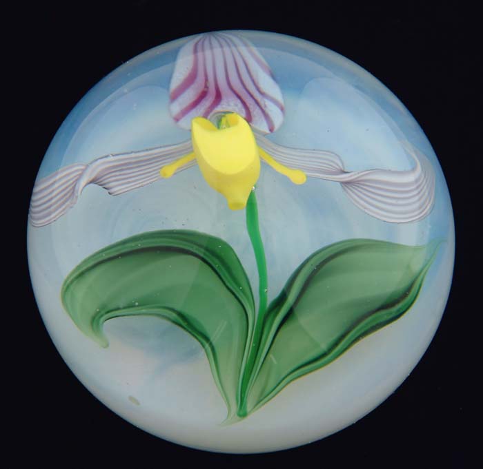 Appraisal: LUNDBERG STUDIOS PAPERWEIGHT Lady slipper orchid in colors of yellow