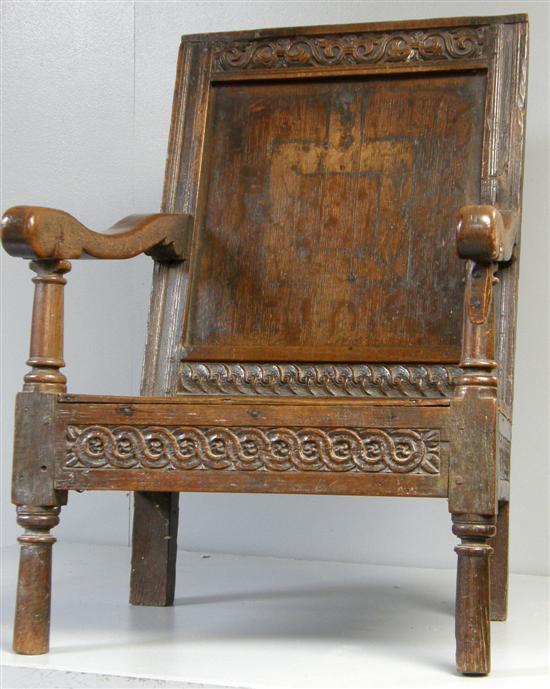 Appraisal: th Century provincial carved oak chair with panelled back the